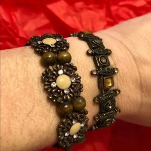 A pair of complimenting bracelets.